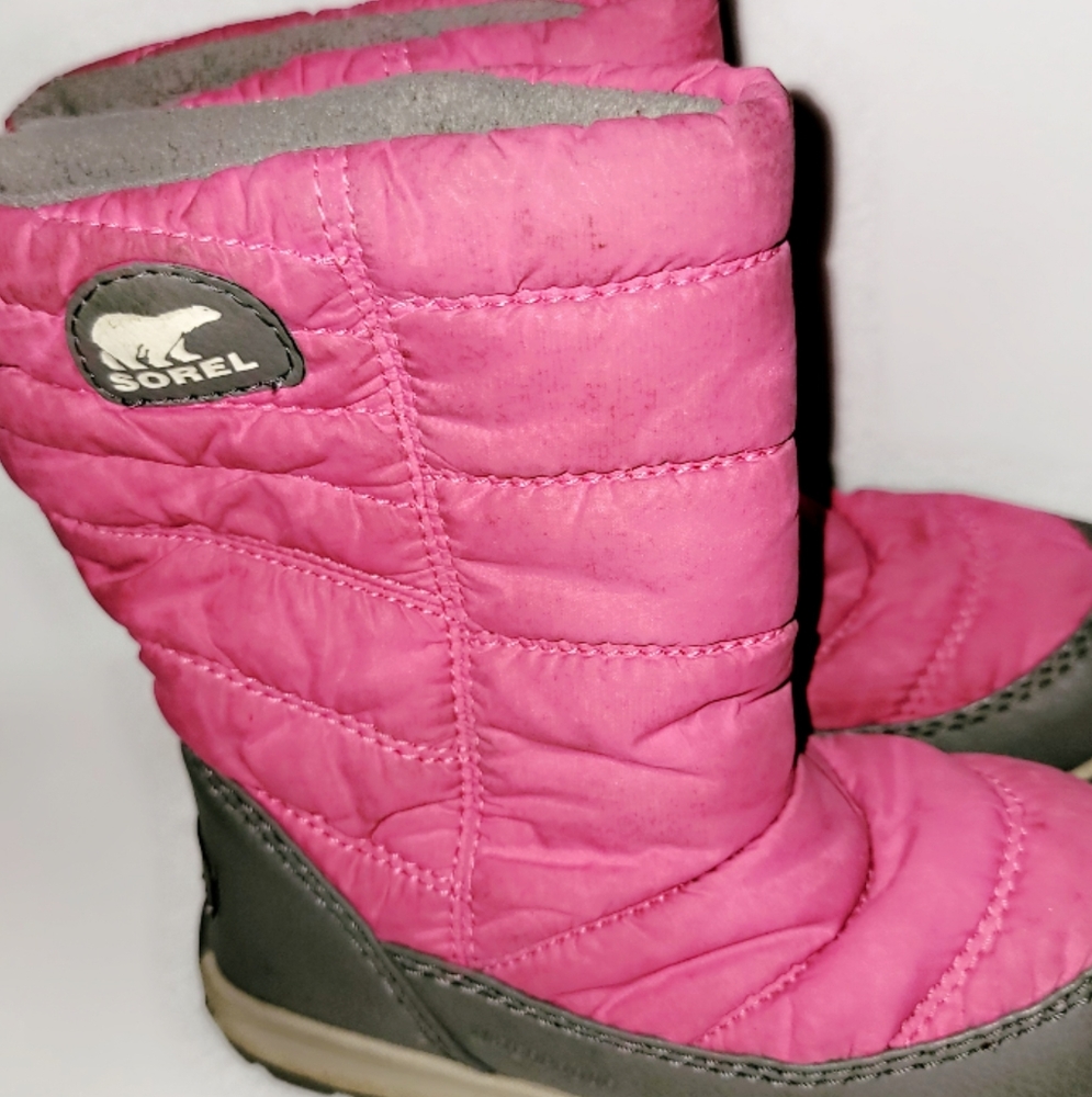 Sorel toddler snow boots, dark pink with fleece gray lining. Size 9.